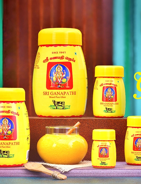 A bright backdrop frames a clear, flawlessly packed container filled with delectable cow ghee.