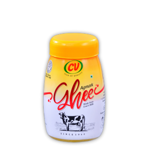 A transparent perfectly packed 500ml container holding  pure cow ghee against a white backdrop