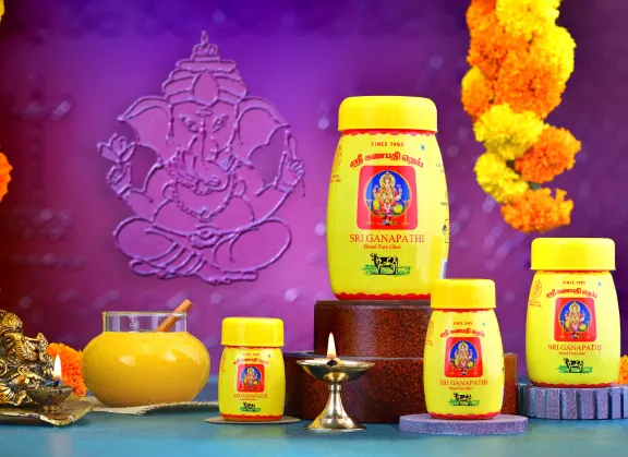 Sri Ganapathi brand's ghee is showcased with other items, the top ghee choice for sweet producers.