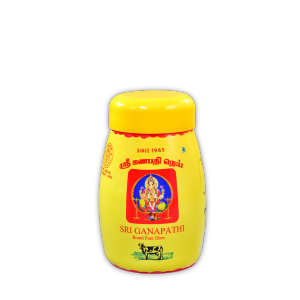 A small yellow jar filled with 1 liter of pure ghee which is made from fresh cow milk, in Coimbatore