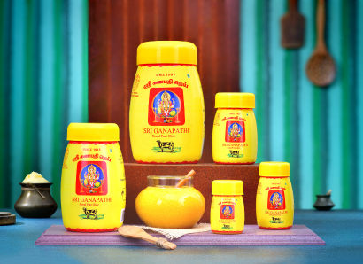 A table with several beautifully labeled jars of cow ghee from a ghee manufacturer in Coimbatore.